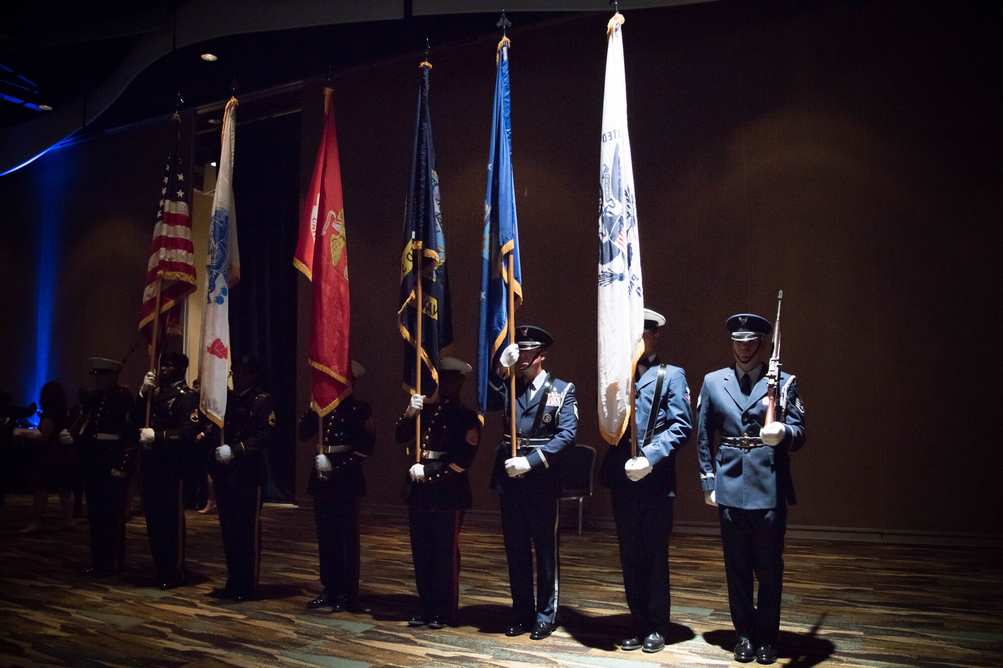 Military honor guard members from each branch of service prepare to post the colors during the 38th annual Salute to the Military Oct. 25 at the Gulf Coast Convention Center in Biloxi, Miss. (U.S. Air Force photo/Senior Airman Heather Heiney)