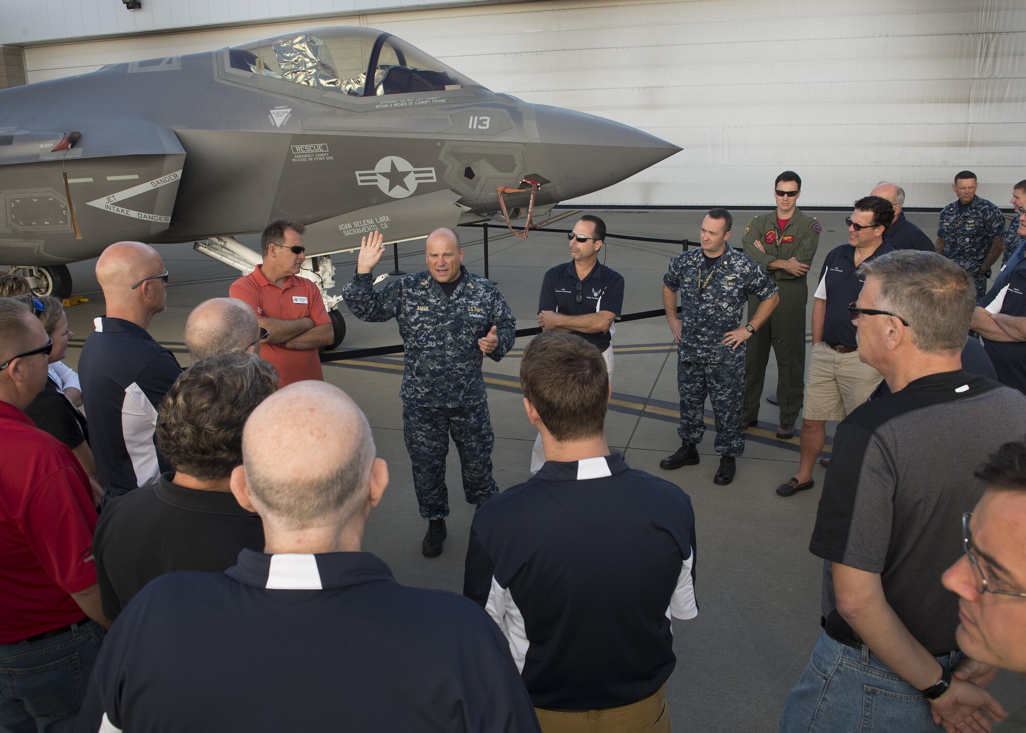 Team Dover honorary commanders and civic leaders receive a briefing on the F-35C Lightning II, operated by the U.S. Navy Fighter Squadron 101 Grim Reapers, during a community relations tour Oct. 20, 2016, at Eglin AFB, Fla. The F-35 is a fifth generation combat aircraft designed for ground attack and air defense missions. (U.S. Air Force photo by Senior Airman Zachary Cacicia)