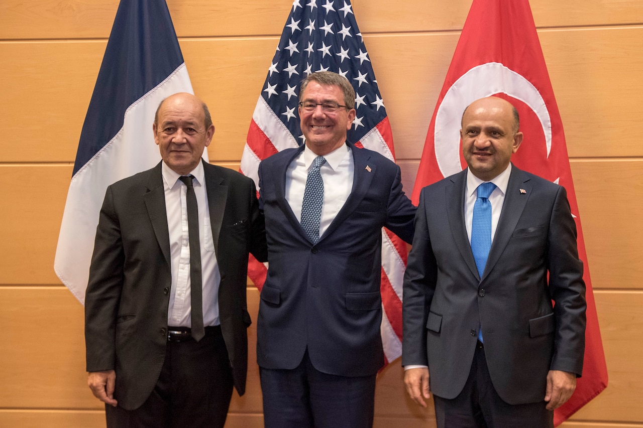 Defense Secretary Ash Carter, center, meets with French Defense Minister Jean-Yves Le Drian, left, and Turkish Defense Minister Fikri Işık at NATO headquarters in Brussels, Oct. 26, 2016. The three defense leaders discussed the effort in Iraq and Syria to counter the Islamic State of Iraq and the Levant. DoD photo by Air Force Tech. Sgt. Brigitte N. Brantley