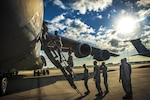 Airmen with the 59th Medical Support Squadron climb into a C-5M Super Galaxy aircraft Oct. 26, 2016 at Joint Base San Antonio-Lackland, Texas. In addition to boarding the Air Force's largest aircraft, the Airman toured the formal training unit for all C-5M Super Galaxy aircrew training. (U.S. Air Force photo by Benjamin Faske)
