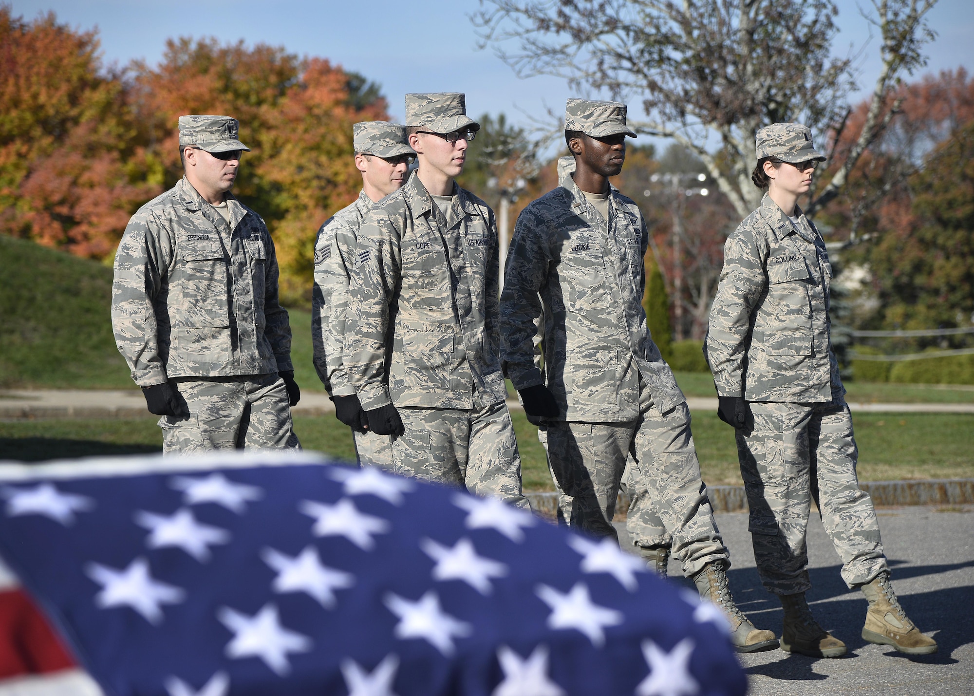Members of the Patriot Honor Guard team participate in a funeral honors training exercise at Hanscom Air Force Base, Mass., Oct. 20. The team provides military funeral honors throughout New England and parts of New York for active duty, retired members and veterans who served in the United States Air Force honorably. (U.S. Air Force photo by Mark Wyatt)