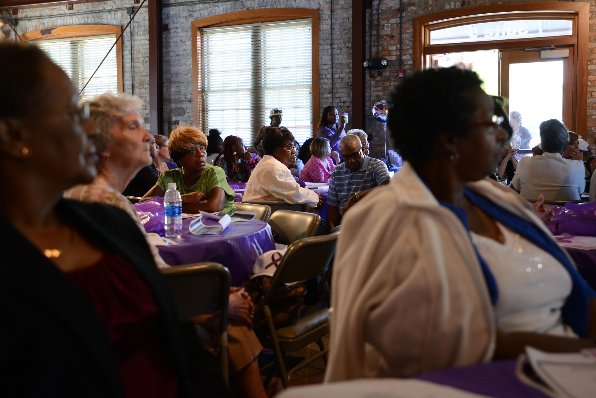 Members of the Sumter community attend a Domestic Violence Survivor’s Luncheon hosted by Shaw Air Force Base Family Advocacy and YWCA Upper Lowlands in Sumter, S.C., Oct. 20, 2016. Mildred Muhammad, guest speaker and ex-wife of John Muhammad, the D.C. Sniper, shared her experiences in order to encourage fellow survivors and shed light on the subject of domestic violence. (U.S. Air Force photo by Airman 1st Class Kelsey Tucker)
