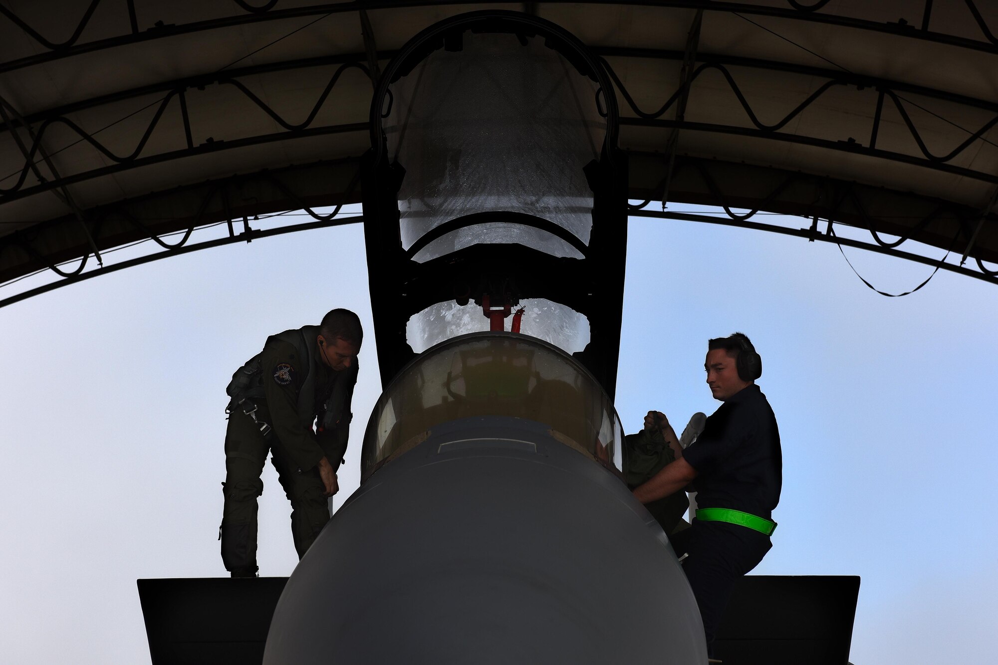 Lt. Col. Chris Auger, 4th Operations Support Squadron weapons system officer (left), and Airman 1st Class Garrett Titera, 4th Aircraft Maintenance Squadron crew chief (right), inspect the cockpit of an F-15E Strike Eagle before takeoff during Razor Talon, Oct. 21, 2016, at Seymour Johnson Air Force Base, North Carolina. Razor Talon is a low-cost, large-force training exercise for joint East Coast tactical and support aviation units. (U.S. Air Force photo by Airman Miranda A. Loera)