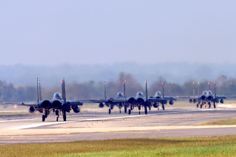 Several F-15E Strike Eagle aircraft prepare for takeoff during Razor Talon, Oct. 21, 2016, at Seymour Johnson Air Force Base, North Carolina. Razor Talon is a low-cost, large-force training exercise for joint East Coast tactical and support aviation units. (U.S. Air Force photo by Airman Miranda A. Loera)