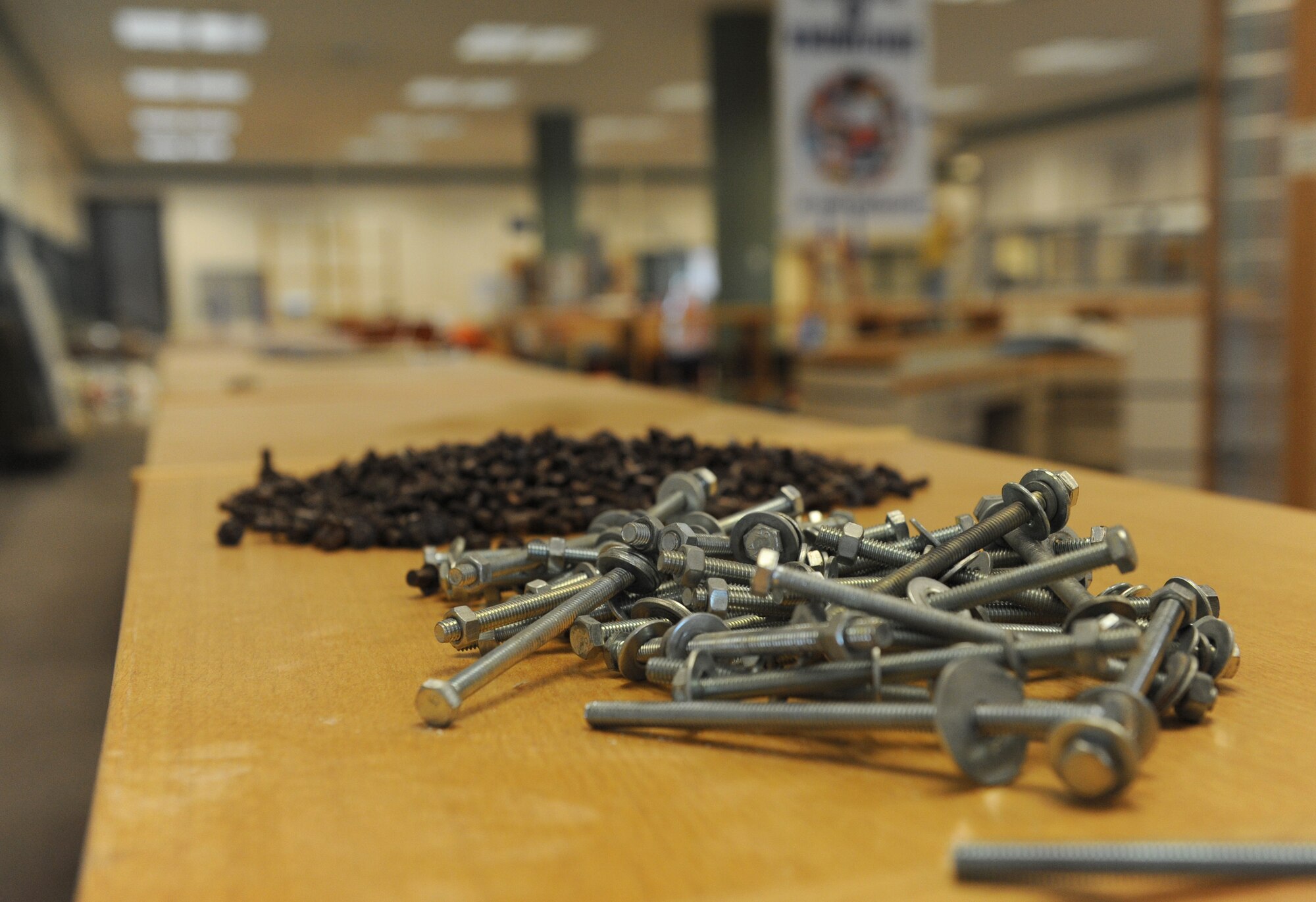 Construction hardware sits on a shelf at the McBride Commons Oct. 24, 2016, on Keesler Air Force Base, Miss. The renovation project will transform the former base library into a common area housing a children’s library, computer stations, engraving, framing, marketing and print shops and a full kitchen. The nine-month project is expected to be completed by May 2017. (U.S. Air Force photo by Kemberly Groue/Released) 
