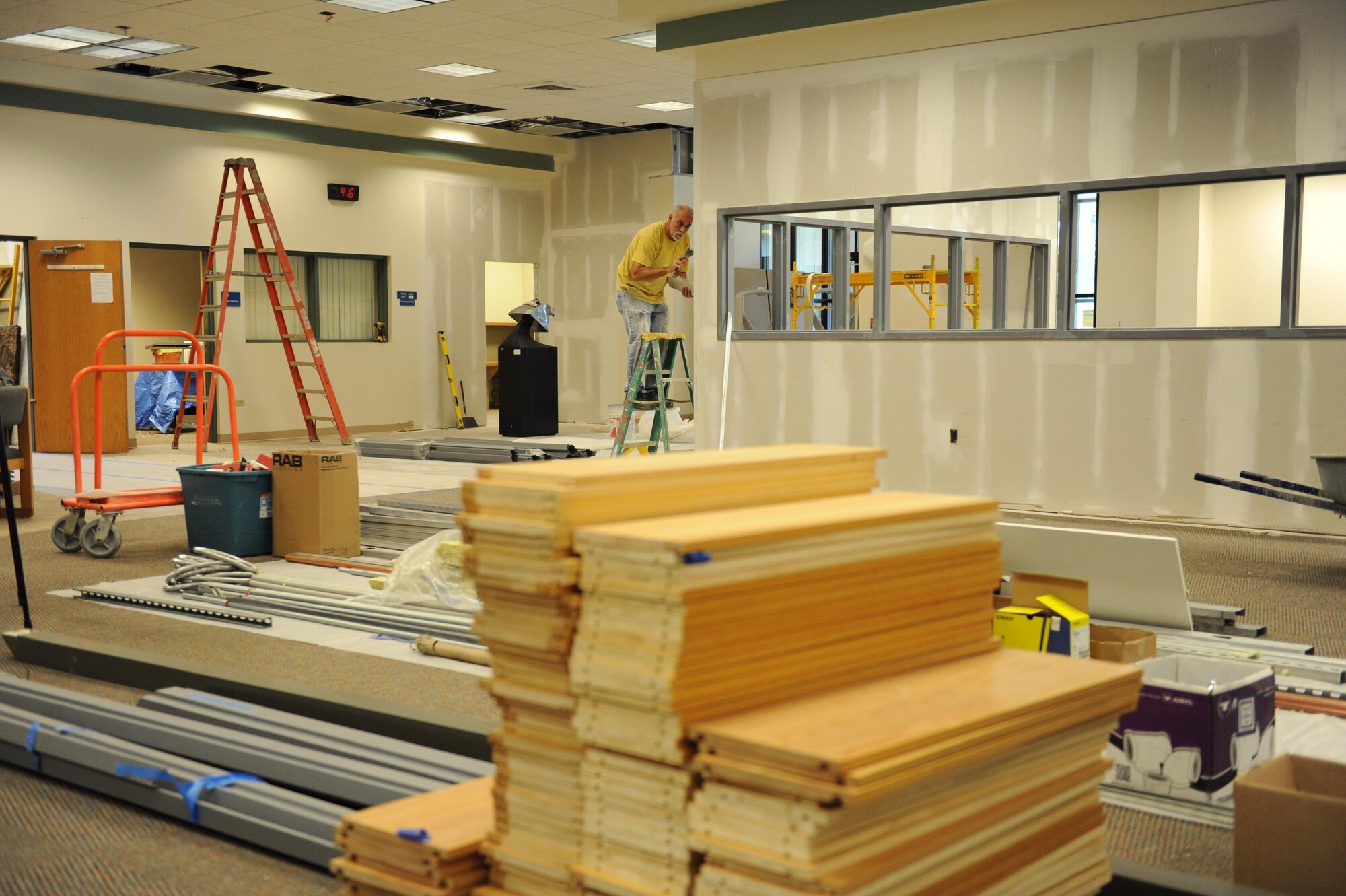 Lonnie Owens, DNP Inc. finisher, applies sheetrock finishing to newly built walls at the McBride Commons Oct. 24, 2016, on Keesler Air Force Base, Miss. The renovation project will transform the former base library into a common area housing a children’s library, computer stations, engraving, framing, marketing and print shops and a full kitchen. The nine-month project is expected to be completed by May 2017. (U.S. Air Force photo by Kemberly Groue/Released) 