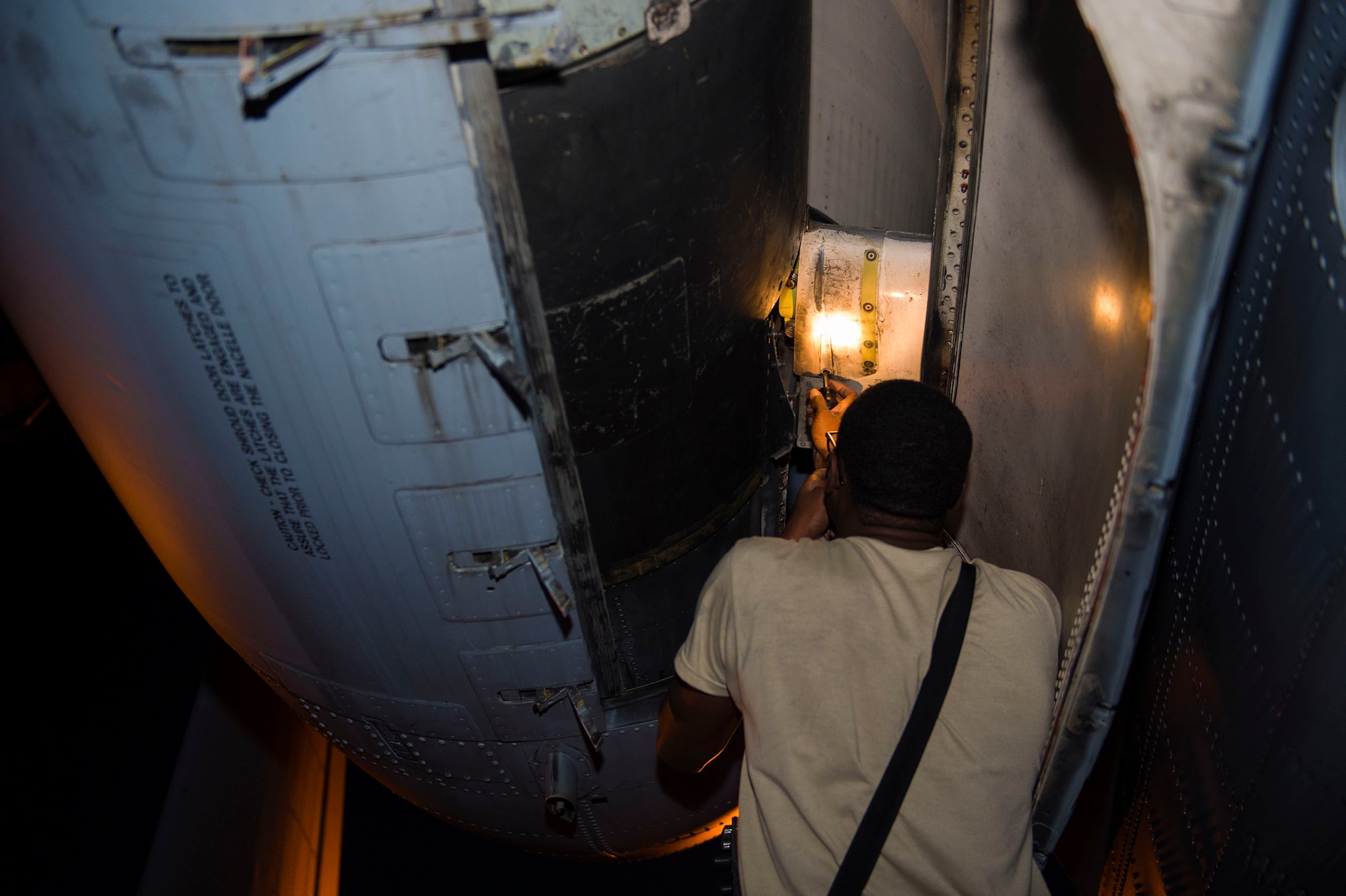Senior Airman Taylor Garcia, 74th Aircraft Maintenance Unit electrical and environmental systems specialist, checks the components of an A-10C Thunderbolt II prior to night operational flight training, Oct. 26, 2016, at Moody Air Force Base, Ga. Garcia is responsible for inspecting, troubleshooting and maintaining electrical and environmental systems of the A-10. (U.S. Air Force photo by Airman 1st Class Greg Nash)