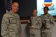 U.S. Air Force Col. David Vaclavik, 20th Mission Support Group commander, presents Master Sgt. Crystal Malave, 20th Maintenance Group development and instructional element chief, and Master Sgt. Latorya Young, 20th MXG training management chief, with Airman Up! awards at Shaw Air Force Base, S.C., Oct. 26, 2016. Malave and Young were recognized as superior performers for the 20th MXG during the 20th Fighter Wing’s last unit effectiveness inspection. (U.S. Air Force photo by Airman 1st Class Kelsey Tucker)