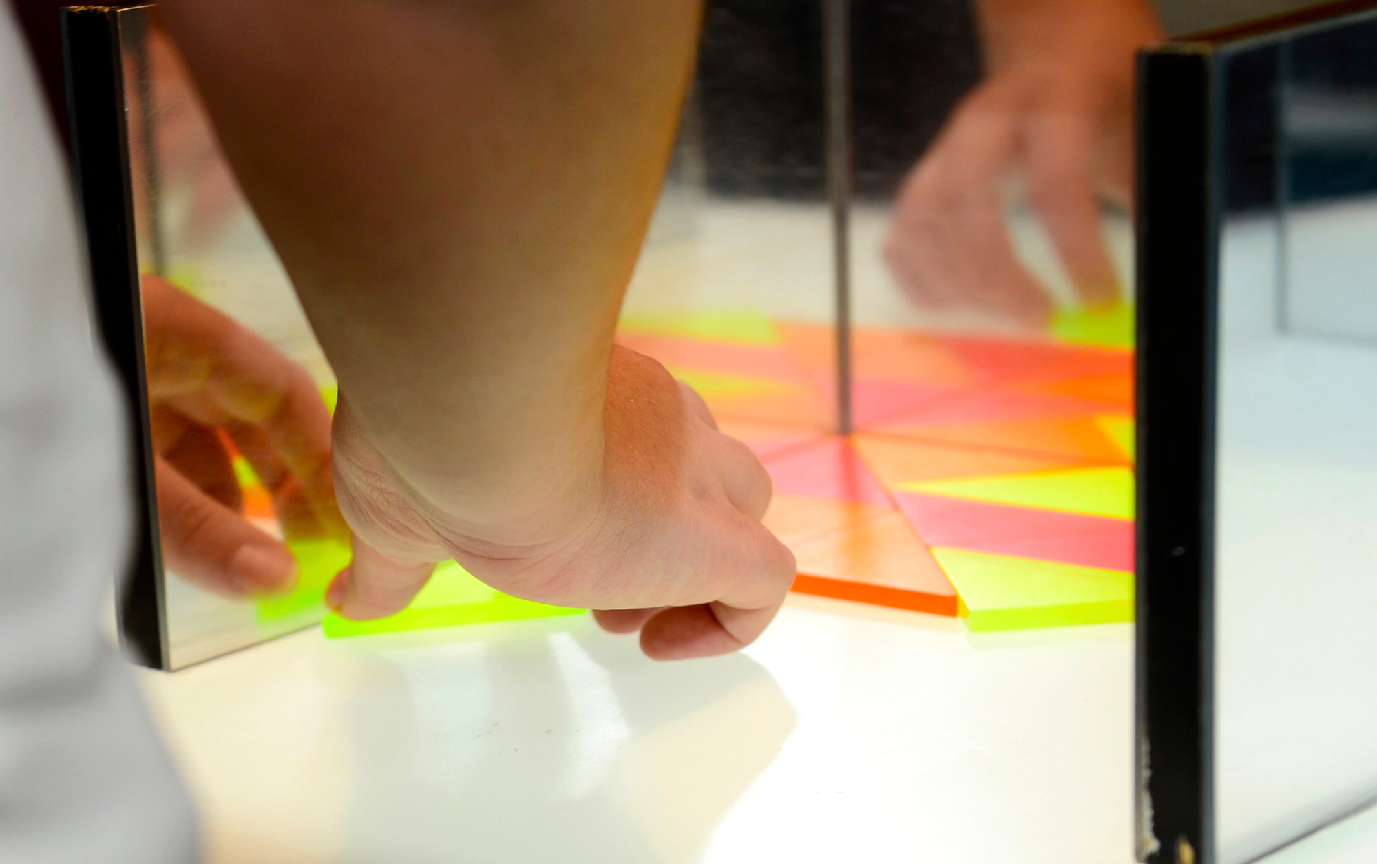 A student from Kecoughtan High School plays with geometrical shapes in the MathAlive! exhibit at the Virginia Air and Space Center in Hampton, Va., Oct. 20, 2016. The VASC is currently hosting the traveling exhibit during its military tour until January 8, 2017. (U.S. Air Force photo by Airman 1st Class Kaylee Dubois)