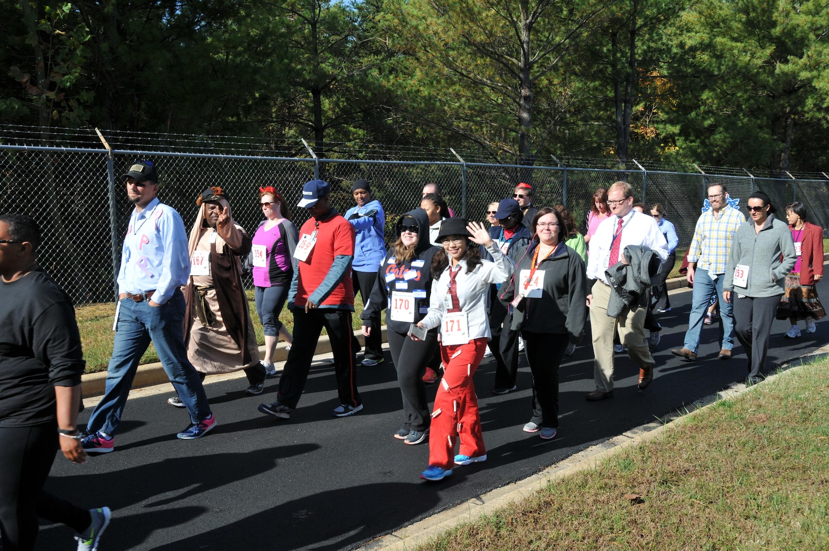 A selection of the walking group at start of the Monster Dash shows a variety of creative costumes and those happy to enjoy a walk in good weather.