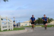 Second Lt. Isaac Lewis and 2nd Lt. Zachary Turek, 47th Student Squadron transition flight members, carry heavy packs to the next station in Laughlin’s Wingman Challenge on Laughlin Air Force Base, Texas, Oct. 15, 2016. The Wingman Challenge exercises competitors’ minds, bodies and wingmanship. (U.S. Air Force photo/Airman 1st Class Benjamin N. Valmoja)