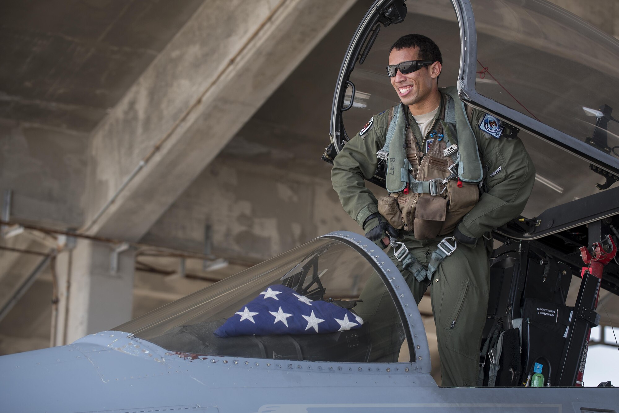 U.S. Air Force Capt. Joseph Carroll, 44th Fighter Squadron pilot, exits an F-15 Eagle Oct. 26, 2016, at Kadena Air Base, Japan. The 44th FS provides security for U.S. and coalition partners in a strategically important spot in the Indo-Asia Pacific region. (U.S. Air Force photo by Airman 1st Class Corey M. Pettis/Released)