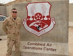 Shawn J. Jones, a public affairs specialist with Defense Logistics Agency Troop Support, is pictured at the Combined Air and Space Operations Center, Al Udeid Air Base, Qatar, during a deployment to Southwest Asia as an Air Force staff sergeant in 2008. He served on U.S. Air Force Central Command's news team, reporting from Iraq, Kuwait, Djibouti, Kenya and Qatar.