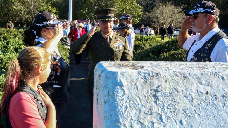 Col. Steven Wolf, commanding officer of the School of Infantry – East, salutes former Marines and their family members in the Rolling Thunder organization as he paves the way for former Marines with 1st battalion 8th Marines and their family members at Camp Geiger on Marine Corps Air Station New River, Oct. 23, 2016. The ceremony is one of three memorial ceremonies conducted in the Marine Corps Base Camp Lejeune area every year to memorialize the Beirut Bombing with Marines from 1st Battalion 8th Marines.