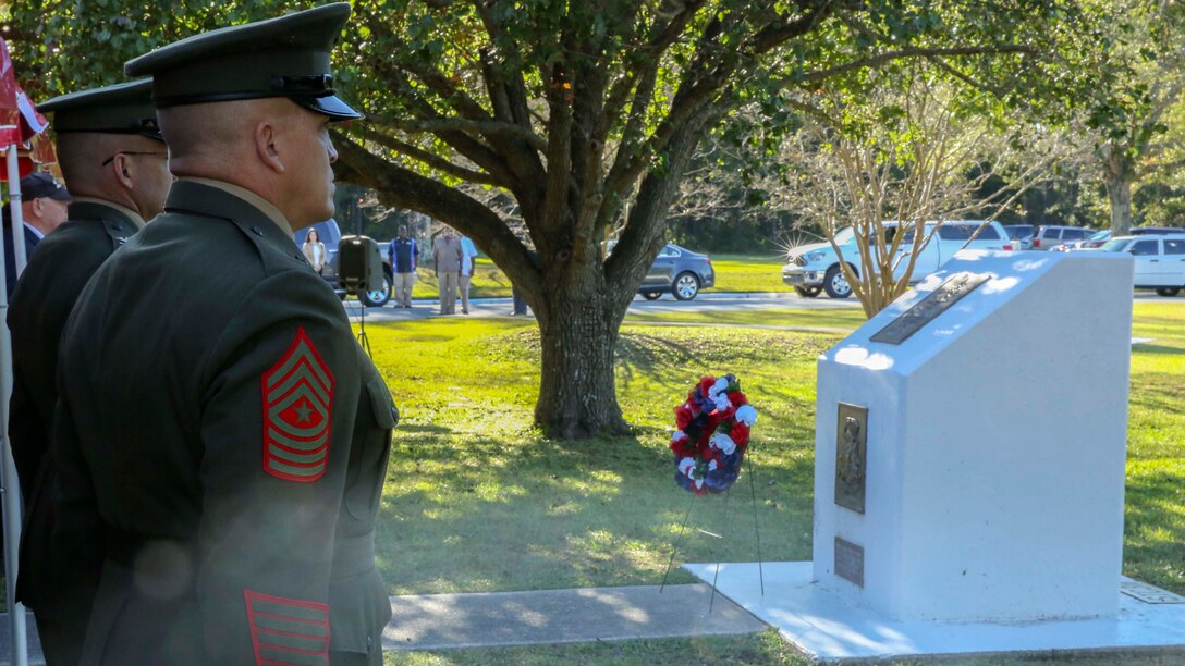 Sgt. Maj. Robert Brown, Sgt. Maj. of School of Infantry – East, stands at attention during a moment of silence for the fallen Marines in 1st Battalion 8th Marines at Camp Geiger Marine Corps Air Station New River, Oct. 23, 2016.  The ceremony is one of three memorial ceremonies conducted in the Marine Corps Base Camp Lejeune area every year to memorialize the Beirut Bombing with Marines from 1st Battalion 8th Marines.