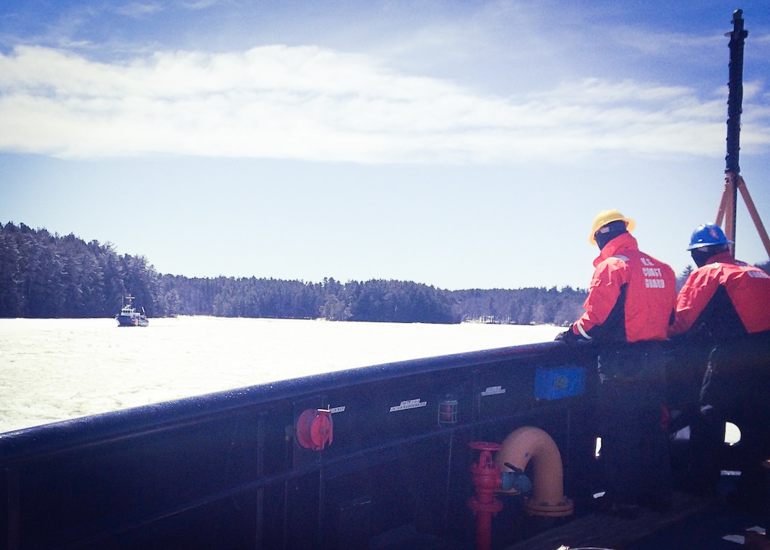 Coast Guard Cutters Tackle and Thunder Bay pass each other while breaking
ice on the Kennebec River, Maine. The cutters worked in concert to reduce
the risk of flooding by breaking up large sections of ice into manageable
sections that can more easily flow through choke points and out to sea.
(U.S. Coast Guard photo by Petty Officer 2nd Class LaNola Stone)