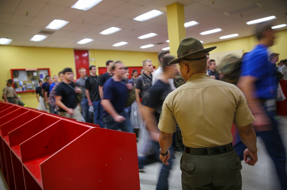 New recruits from Lima Company, 3rd Recruit Training Battalion, enter the contraband room during receiving at Marine Corps Recruit Depot San Diego, Oct. 24, 2016. At this time, recruits are required to discard any contraband they may have brought with them. Annually, more than 17,000 males recruited from the Western Recruiting Region are trained at MCRD San Diego. Lima Company is scheduled to graduate Jan. 20, 2017.