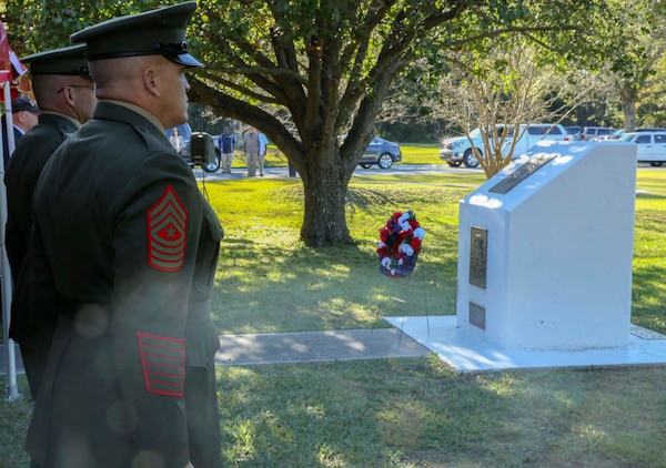 Sgt. Maj. Robert Brown, School of Infantry East sergeant major, pays respects for the fallen Beirut Marines of 1st Battalion, 8th Marines, during a wreath laying ceremony at Camp Geiger Marine Corps Air Station New River, Oct. 23.  The ceremony is one of three memorial ceremonies conducted in the Marine Corps Base Camp Lejeune area every year to memorialize the  Marines from 1st Battalion, 8th Marines.