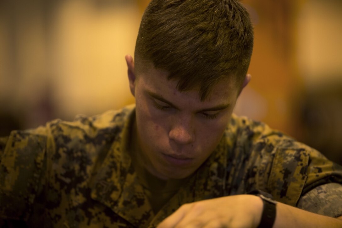 Cpl. Matthew A. Long works on a High Mobility Multipurpose Wheeled Vehicle (HMMWV) engine on Camp Kinser, Okinawa, Japan, October 25, 2016. Long was selected as a winner in a Marine Corps logistical innovation competition for incorporating a blood clotting agent and pain killer with a Small Arms Protective Insert (SAPI) to minimize the time between injury and aid. Long, from Moultrie, Georgia, is a motor transport mechanic with Motor Transport Company, Maintenance Battalion, Combat Logistics Regiment 35, 3rd Marine Logistics Group, III Marine Expeditionary Force. (U.S. Marine Corps photo by Lance Cpl. Nelson Duenas/ Released) 