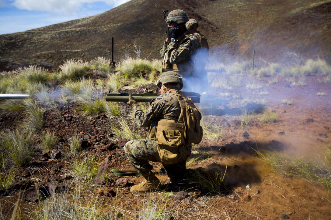 A U.S. Marine assigned to Charlie Company, 1st Battalion 3rd Marine Regiment fires a M72 Light Anti-Tank Weapon during Lava Viper 17.1 at Range 13 aboard the Pohakuloa Training Area, Hawaii, Oct. 22, 2016. Lava Viper is an annual combined arms training exercise that integrates ground elements such as infantry and logistics, with indirect fire from artillery units as well as air support from the aviation element.