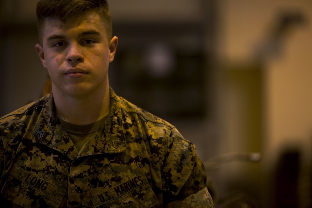 Cpl. Matthew A. Long, a selected winner of a Marine Corps wide logistical innovation competition, smiles for a photo on Camp Kinser, Okinawa, Japan, October 25, 2016. He designed a tear proof package containing a clotting and pain-killing agent to sit behind a Small Arms Protective Insert (SAPI). The package can treat for shock immediately when pierced. Long's innovation began after brainstorming ways to save Marines lives with hopes to minimize the time between injury and treatment. Long, from Moultrie, Georgia, is a motor transport mechanic with Motor Transport Company, Maintenance Battalion, Combat Logistics Regiment 35, 3rd Marine Logistics Group, III Marine Expeditionary Force. (U.S. Marine Corps photo by Lance Cpl. Nelson Duenas/ Released) 