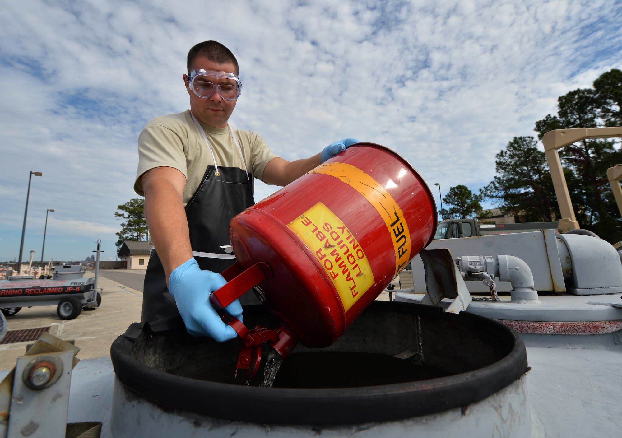 Staff Sgt. Timothy Andrews, NCO in charge of the fuels lab of the 1st Special Operations Logistics Readiness Squadron, pours reclaimed fuel into a small storage tank at Hurlburt Field Fla., Oct. 25, 2016. Reclaimable fuel is reused after testing to prevent the waste of fuel. (U.S. Air Force photo by Senior Airman Andrea Posey)
