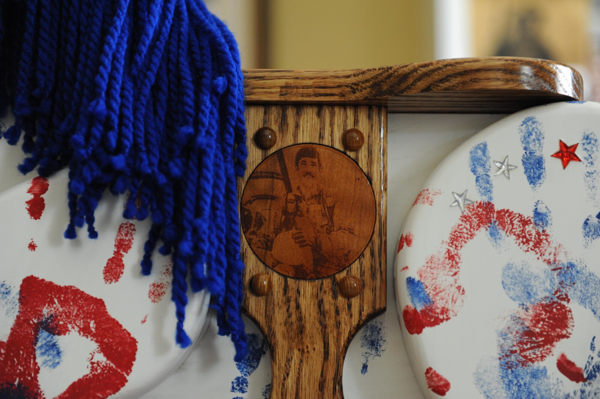 An image of 1st Lt. Michael Blassie, Jr., adorns a “Patriotic Pony” at the Keesler Fisher House during a dedication ceremony Oct. 24, 2016, on Keesler Air Force Base, Miss. Hero’s Rock, a non-profit organization, dedicated the handmade pony in memory of Blassie, who was killed in action in Vietnam May 11, 1972. Since Sept. 1, 2016, Hero’s Rock delivered 18 “Patriotic Ponies” to 12 Fisher House locations; with Keesler being the final stop. The group created each pony in memory of a military member killed in action.  (U.S. Air Force photo by Kemberly Groue/Released) 
