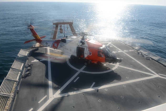 A Coast Guard Air Station Kodiak MH-60 Jayhawk touches down onto the Coast Guard Cutter Healy’s flight deck during touch-and-go training southwest of Kodiak Island. (U.S. Coast Guard photo by Petty Officer 1st Class Kelly Parker)