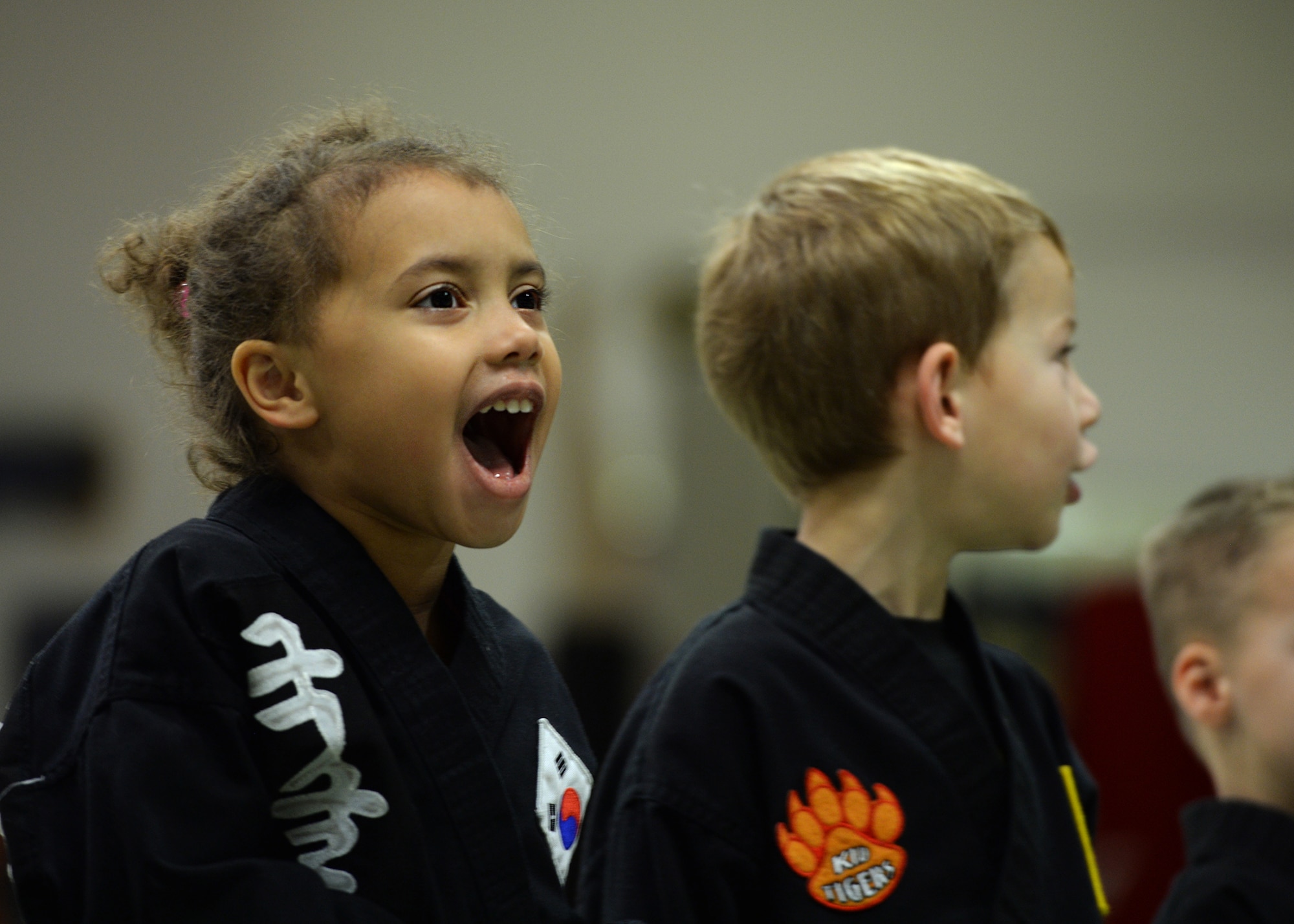 Claire Gentry, a member of the Kuk Sool Won martial arts class, yells, ‘stranger danger’ at Ramstein Air Base, Germany, Oct. 22, 2016. Children are taught to yell ‘stranger danger’ when a stranger tries to get to close to get attention from anyone who can help. (U.S. Air Force photo by Senior Airman Jimmie D. Pike)