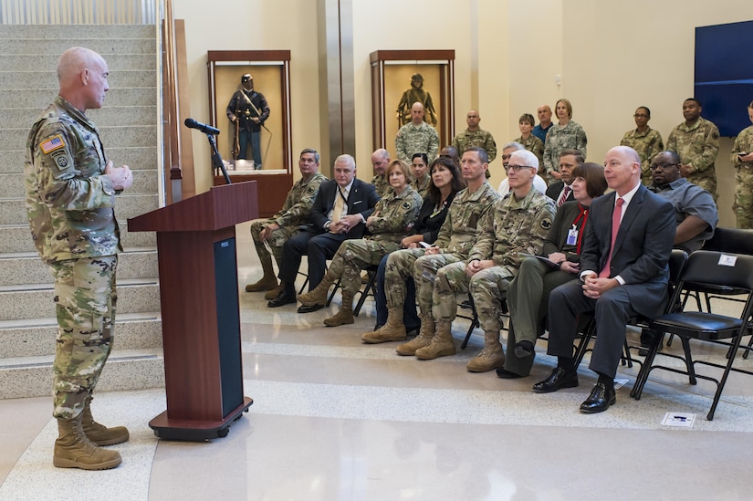 LTG Charles D. Luckey, Commanding General, U.S. Army Reserve Command, gives his remarks during a farewell ceremony for James Balocki, seated right, U.S. Army Reserve chief executive officer, at the USARC headquarters, Oct. 26, 2016, at Fort Bragg, N.C. Balocki says goodbye to the Army after a combined 35 years of uniformed and civilian service to take a Senior Executive Service position with the Department of the Navy. (U.S. Army photo by Timothy L. Hale)(Released)