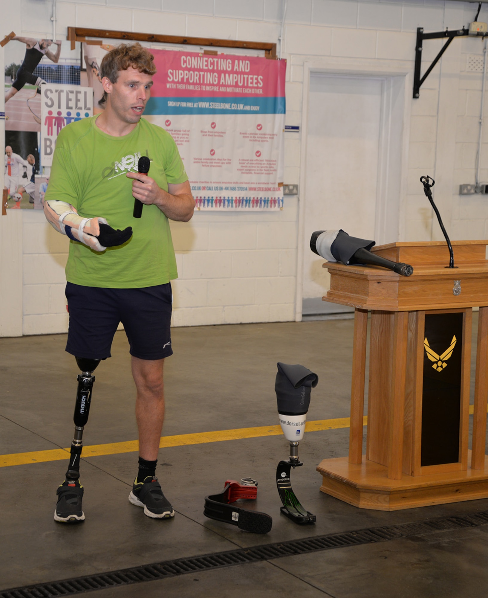 Danny Campion, an amputee and member of Steel Bones, talks to participants and military members at an event Oct. 24, 2016, on RAF Mildenhall, England. Campion’s right arm was paralyzed due to nerve damage and he lost his right leg in a motorcycle accident in 2012. Steel Bones is a local British organization similar to the Wounded Warrior Program, specifically aimed at amputees and their families. (U.S. Air Force photo by Karen Abeyasekere)