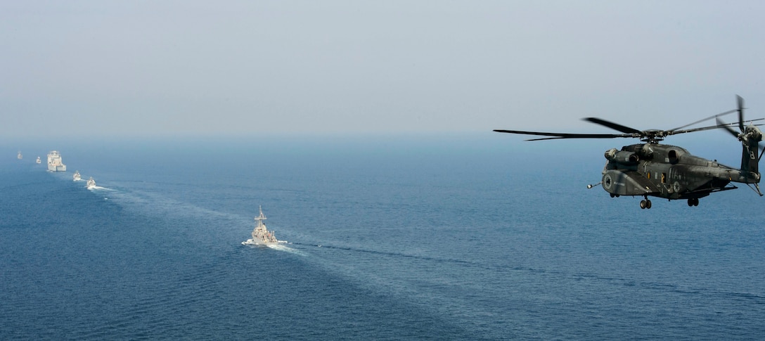 161003-N-RZ218-0572



A MH-53E Sea Dragon assigned to the Blackhawks of Helicopter Mine Countermeasure Squadron 15 (HM-15), starts to maneuver into position with ships from Commander, Task Force, 52 off the coast of Bahrain as part of UK/U.S. Mine Countermeasures Exercise 17-1, Oct. 19, 2016. The bilateral exercise serves to enhance cooperation, mutual MCM capabilities and interoperability between the U.S. and UK Naval forces in ensuring free flow of commerce, freedom of navigation and long-term regional security.. HM-15 is a forward deployed naval force asset attached to Commander, Task Force 53 to provide combat logistics and search and rescue capability throughout the U.S. 5th fleet area of responsibility. (U.S. Navy Combat Camera photo by Petty Officer 2nd Class John Paul Kotara II)