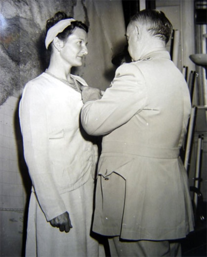 President Harry Truman received a memorandum offering the opportunity to present the Distinguished Service Cross (DSC) to Virginia Hall, May 12, 1945. She was the first civilian woman to win the award. 