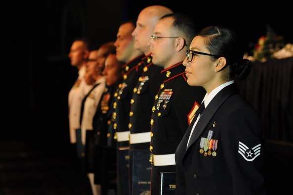 Staff Sgt. Michelle Pascas, 81st Diagnostic and Therapeutics Squadron food production and services NCO in charge, and fellow Thomas V. Fredian Community Leadership Award nominees receive recognition during the 38th Annual Salute to the Military at the Mississippi Coast Convention Center, Oct. 25, 2016, Biloxi, Miss. The Salute to the Military event recognized the men and women who serve in the military along the Gulf Coast. (U.S. Air Force photo by Kemberly Groue/Released)