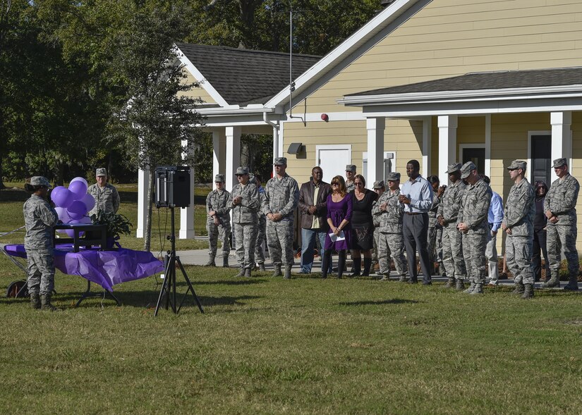Members of Joint Base Charleston attend a candlelit vigil to raise awareness for domestic abuse victims and honor military families affected by abuse at the Hunt Community Center here, Oct. 24, 2016. The Family Advocacy Office has been raising awareness throughout October to educate members of Team Charleston about domestic abuse in the military and the resources available to victims as part of Domestic Abuse Prevention Month.