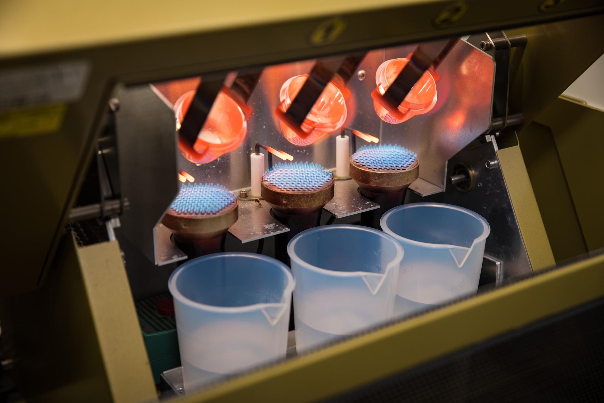 Three samples are dissolved using automated fusion at the United States Air Force School of Aerospace Medicine’s Radioanalytical Laboratory. The laboratory is one of only a few in the world with the capability to perform automated fusion -- a much faster and safer alternative to traditional acid digestion methods. Using fusion, samples are ready to be tested for radioactive materials in 5 minutes rather than days or even weeks. (U.S. Air Force photo/Rick Eldridge)