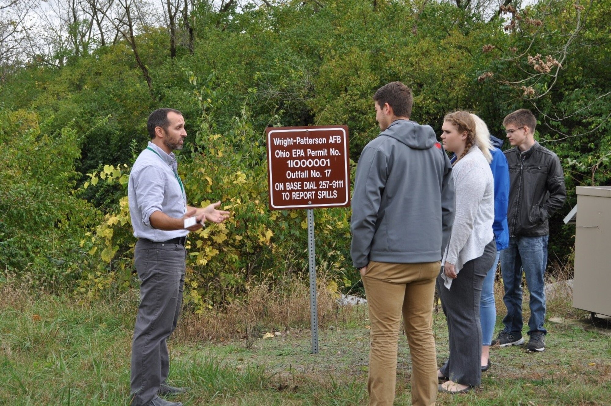 Students from Blake Ullery Milton-Union High School, Margaret Lingare Global Impact STEM Academy, Amelia Kvalheim Oakwood High School and Scott Cooper CinDay Academy are given a presentation at Outfall 17 on protecting our water resources by Michael Vaughn, 88th Civil Engineer Group, as part of the annual Job Shadow Day. (U.S. Air Force photo/Brittney Mitchell)
