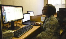 U.S. Air Force Staff Sgt. Dashurna Riggs, 325th Logistic Readiness Squadron traffic management specialist, uses one of 16 new computers at the Tyndall library, Oct. 26, 2016. The Tyndall library received new computers to better accommodate new Airmen that may not have access to a computer to fulfill their internet needs. (U.S. Air Force photo by Airman 1st Class Cody R. Miller/Released) 
