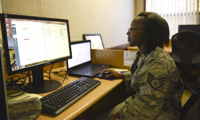 U.S. Air Force Staff Sgt. Dashurna Riggs, 325th Logistic Readiness Squadron traffic management specialist, uses one of 16 new computers at the Tyndall library, Oct. 26, 2016. The Tyndall library received new computers to better accommodate new Airmen that may not have access to a computer to fulfill their internet needs. (U.S. Air Force photo by Airman 1st Class Cody R. Miller/Released) 
