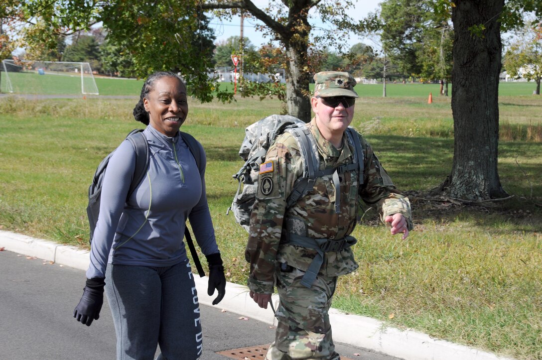 Master Sgt. Samantha St. Louis, left, and Lt. Col. Joseph Ricker, from the U.S. Army Reserve's 99th Regional Support Command, participated in a Red Ribbon 5K Run/3K Walk Oct. 26 at Joint Base McGuire-Dix-Lakehurst, New Jersey.  The event was sponsored by the base's Army Substance Abuse Program office.  Red Ribbon Week pays homage to all the men and women who have made the ultimate sacrifice in support of our nation's struggle against drug trafficking and abuse.