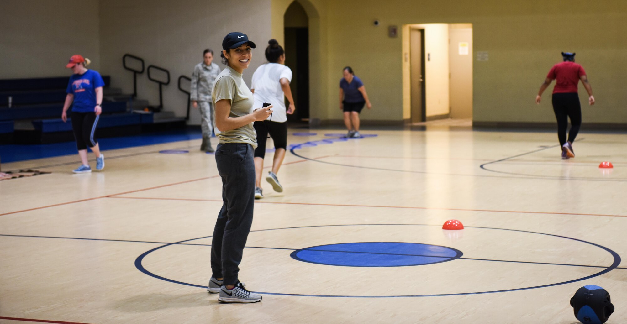 Airman 1st Class Jennifer Raad, physical training rehab course instructor, conducts exercises during a physical training rehab course at Barksdale Air Force Base, La., October 25, 2016. PTRC attendees have seen an average of a 50 percent increase on PT test scores. (U.S. Air Force photo/Senior Airman Luke Hill) 