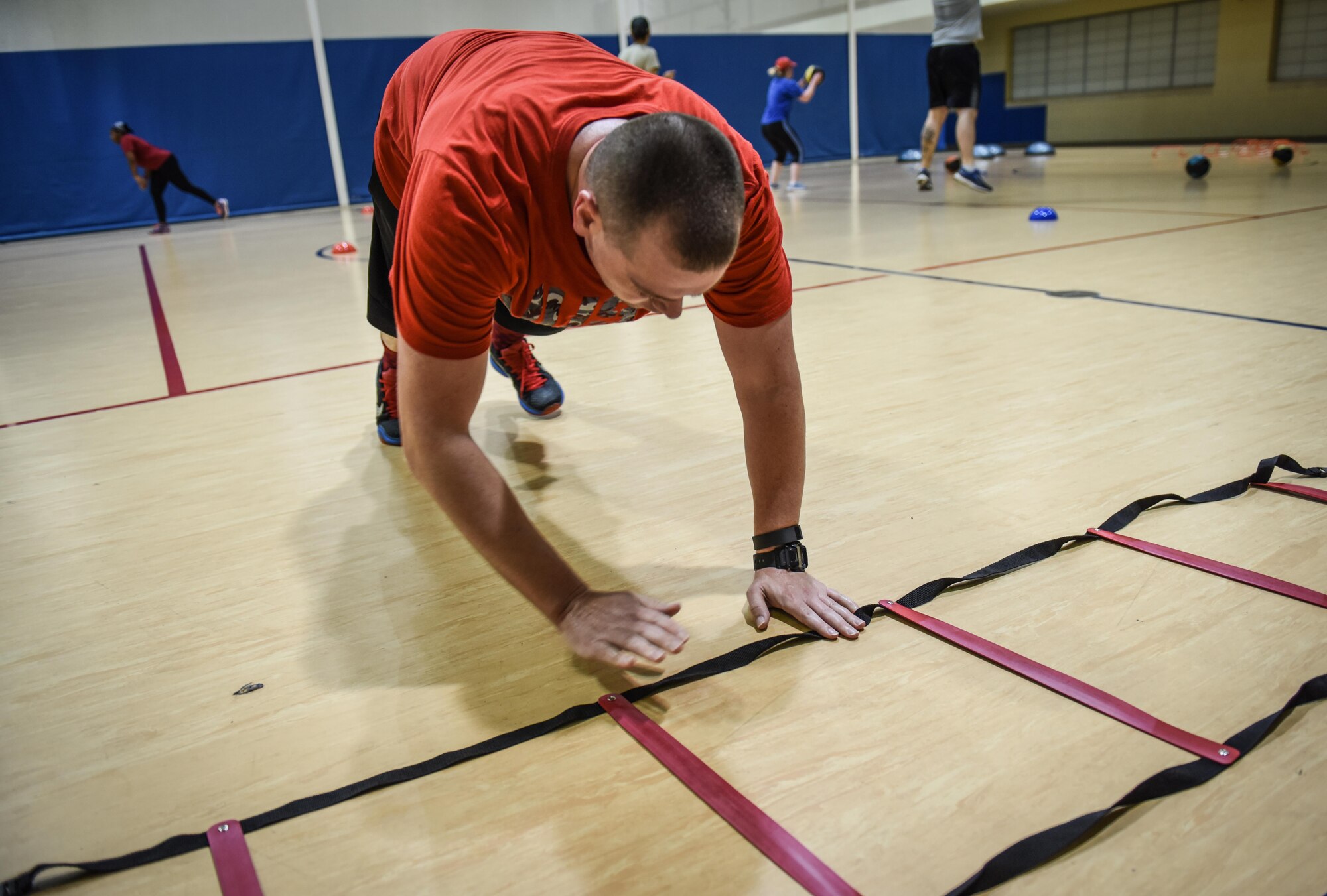 Tech Sgt. Richard James, physical training rehab course participant, performs ladder push-ups during PTRC at Barksdale Air Force Base, La., October 25, 2016. PTRC also allows people who are recovering from injuries to get an effective workout without the worry of reinjuring something. (U.S. Air Force photo/Senior Airman Luke Hill)