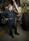 Airman 1st Class Madison Ferguson, 5th Maintenance Squadron phase crew chief, stands next to a B-52H Stratofortress’ landing gear at Minot Air Force Base, N.D., Oct. 21, 2016. Ferguson recently identified hazards on a critical landing gear component during a pre-flight inspection which prevented loss of life and capabilities. (U.S. Air Force photo/Airman 1st Class J.T. Armstrong)