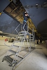 Airman 1st Class Madison Ferguson, 5th Maintenance Squadron phase crew chief, shines a flashlight into the wing of a B-52H Stratofortress at Minot Air Force Base, N.D., Oct. 21, 2016. Ferguson is the maintenance Area 3 crew chief responsible for the right wing of the current B-52H Stratofortress in phase maintenance. (U.S. Air Force photo/Airman 1st Class J.T. Armstrong)