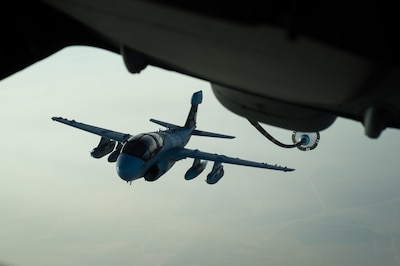 A U.S. Marine Corps EA-6B Prowler separates from a KC-10 Extender refueling operation near Iraq, Oct. 26, 2016. Prowlers specialize in interrupting enemy electronic activity and obtaining tactical electronic intelligence within the combat area. The Prowler has provided protection for strike aircraft, ground troops and ships by jamming enemy radar and communications in the support of the liberation of Mosul, Iraq. Air Force photo by Senior Airman Tyler Woodward