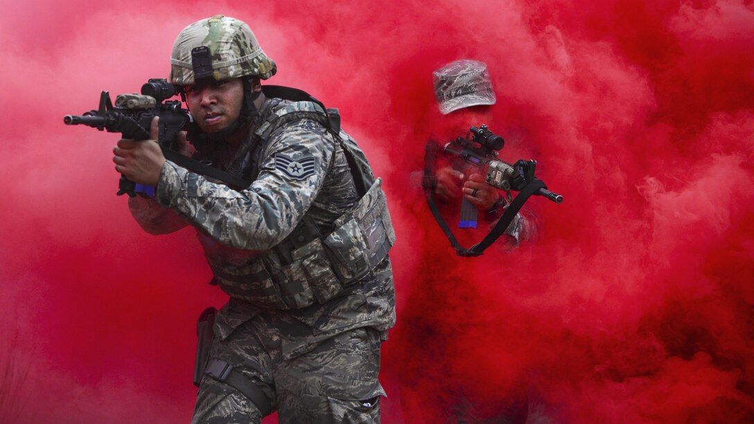<strong>Photo of the Day: Oct. 28, 2016</strong><br/><br />Airmen maneuver through smoke during tactical combat casualty care training at Francis S. Gabreski Airport in Westhampton Beach, N.Y., Oct. 19, 2016. The airmen, ssigned to the 106th Rescue Wing Security Forces Squadron, learned to react to enemy contact and attacks from improvised explosive devices while focusing on combat care. Air National Guard photo by Staff Sgt. Christopher S. Muncy<br/><br /><a href="http://www.defense.gov/Media/Photo-Gallery?igcategory=Photo%20of%20the%20Day"> Click here to see more Photos of the Day. </a> 