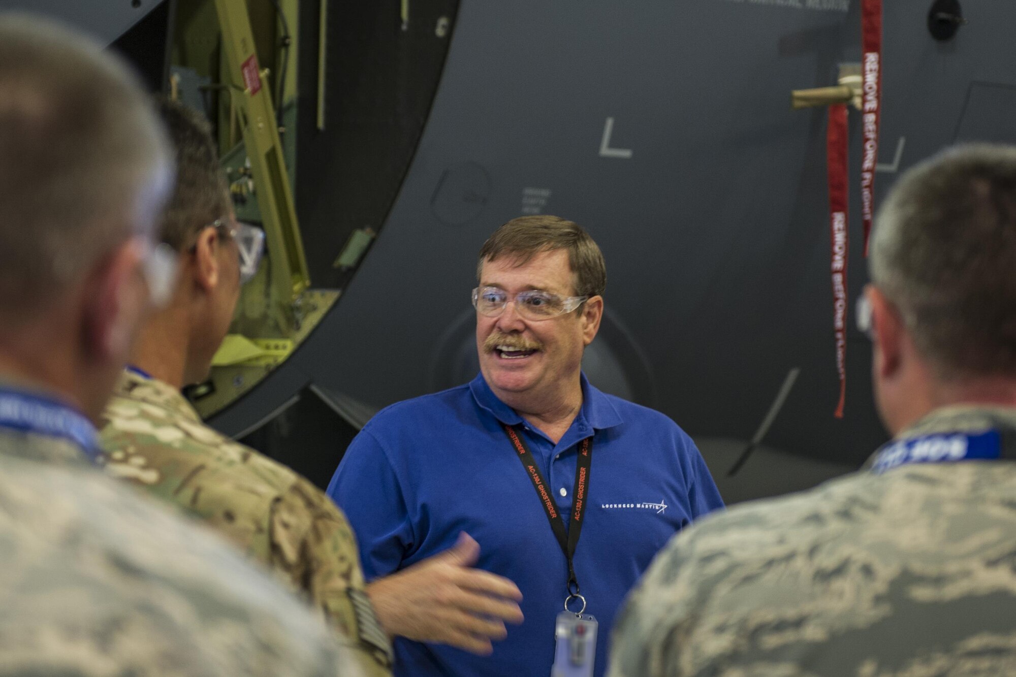 Bill Rawlings, Lockheed Martin productions operations manager for the AC-130J Ghostrider gunship, gives 1st Special Operations Wing senior leaders a tour of the gunship production process at the Lockheed Martin Aerospace Company in Crestview, Fla., Oct. 24, 2016. The MC-130J Combat Talon II aircraft fleet is undergoing modifications to become AC-130J Ghostrider gunships and provide the 1st SOW with improved close air support and air interdiction capabilities. (U.S. Air Force photo by Airman 1st Class Joseph Pick)