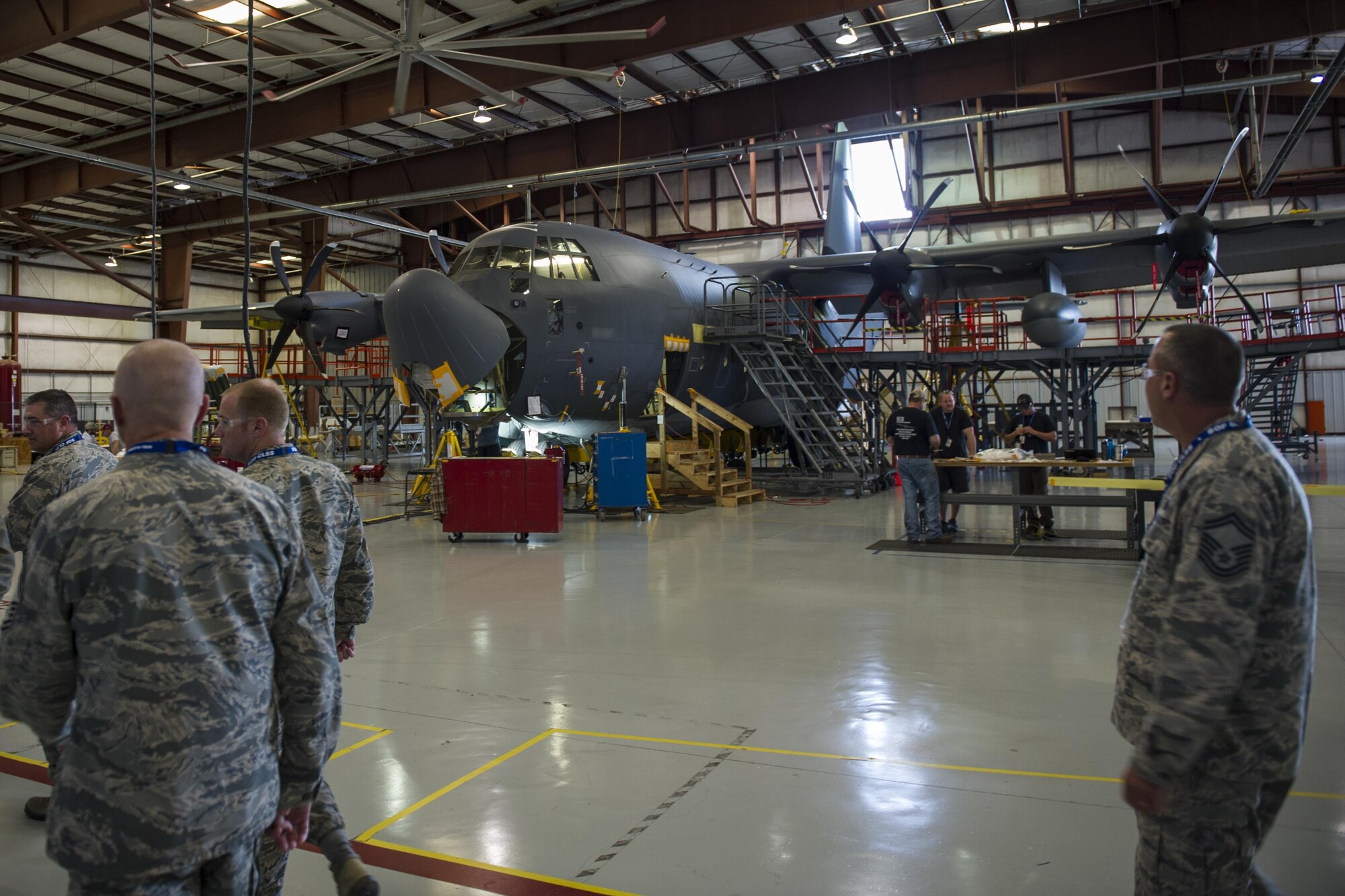 Senior leaders from the 1st Special Operations Wing tour a Lockheed Martin factory in Crestview, Fla., Oct. 24, 2016. The manufacturers are modifying four MC-130J Commando II aircraft to become AC-130J Ghostrider gunships. The AC-130J was developed to provide ground forces an expeditionary, direct-fire platform that is persistent, ideally-suited for urban operations and delivers precision, low-yield munitions against ground targets. (U.S. Air Force photo by Airman 1st Class Joseph Pick)
