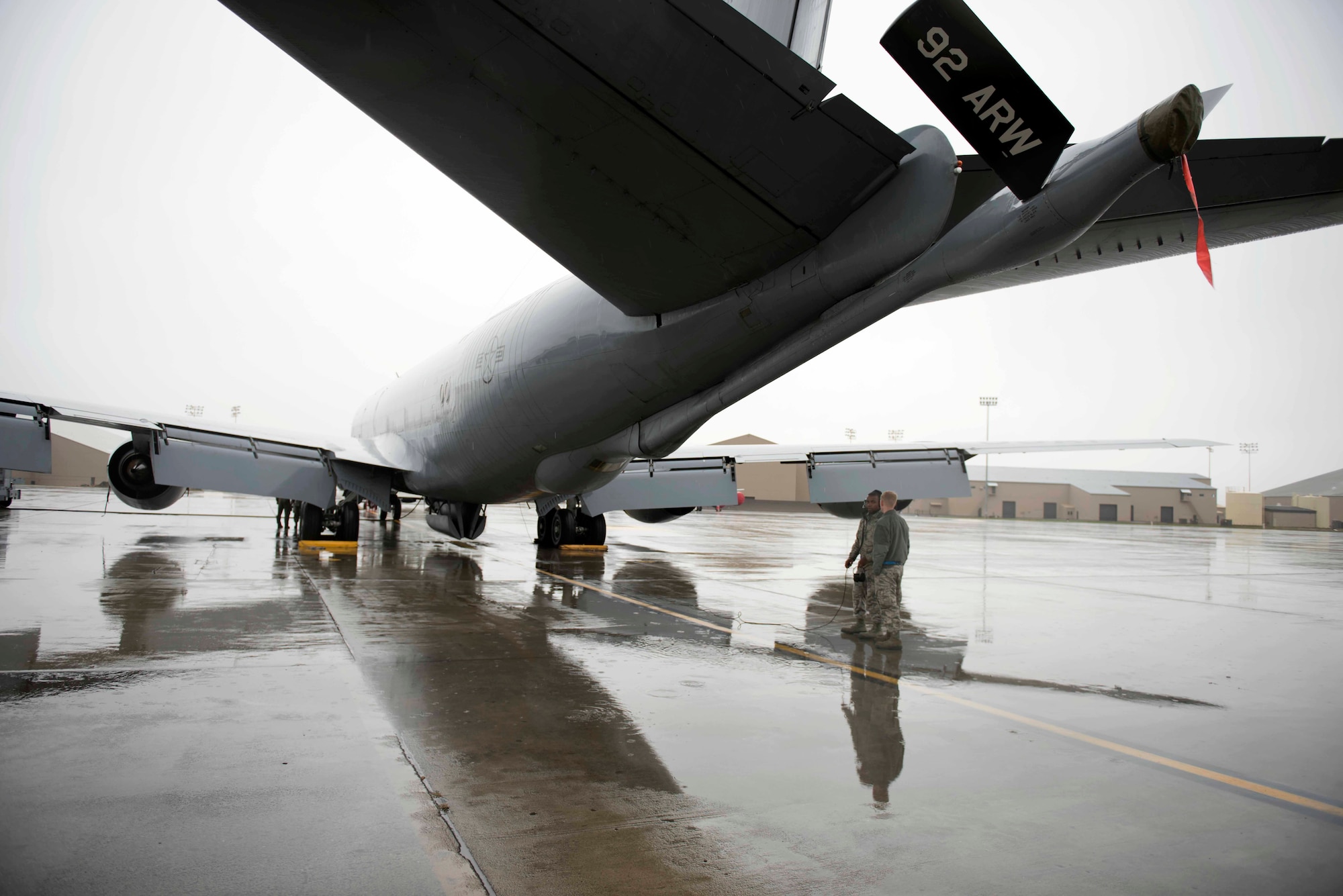 Senior Airman Nicholas Thurman and Airman Alvin Carr, 92nd Maintenance Squadron crew chiefs, perform a flight control check of a KC-135R Stratotanker Oct. 27, 2016, at Fairchild Air Force Base, Wash. The crew chiefs prepped the plane for daily mission requirements. (U.S. Air Force photo/Senior Airman Nick J. Daniello)
