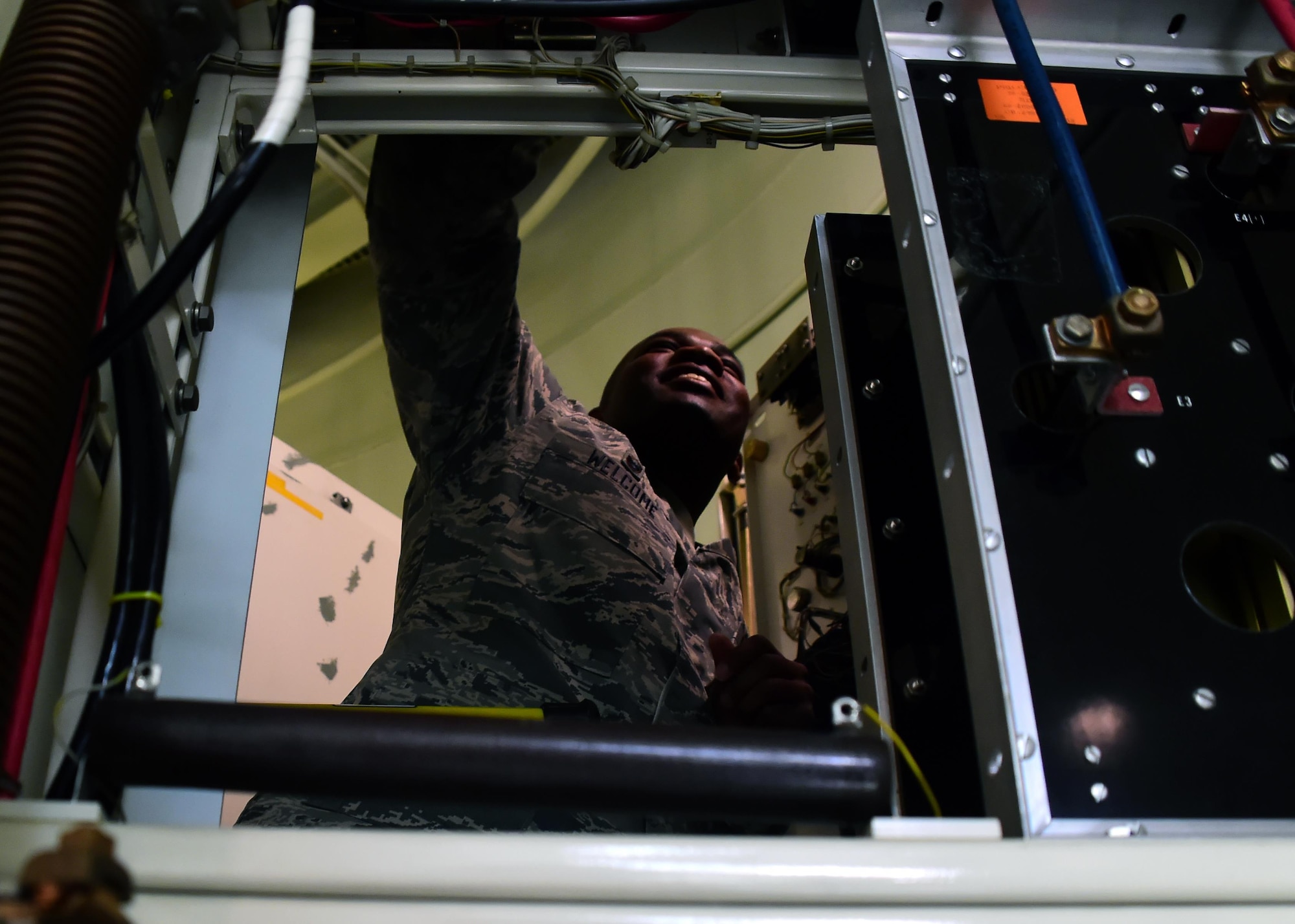 Lt. Col. Eric Welcome, 460th Space Communication Squadron commander, learns how to properly clean one of the power supply towers inside one of the radomes Oct. 20. 2016, on Buckley Air Force Base, Colo. Due to the importance of the radomes, Airmen within the 460th SCS walked Welcome through their weekly maintenance routine to insure operation readiness. (U.S. Air Force photo by Airman Holden S. Faul/ Released)